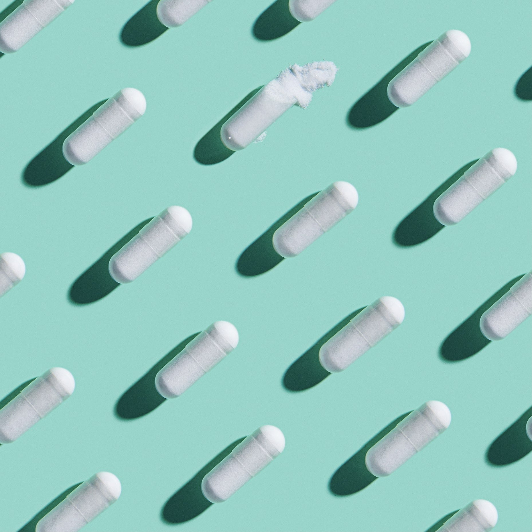 pH-D Feminine Health boric acid suppositories displayed against a teal background, emphasizing quality and purity.